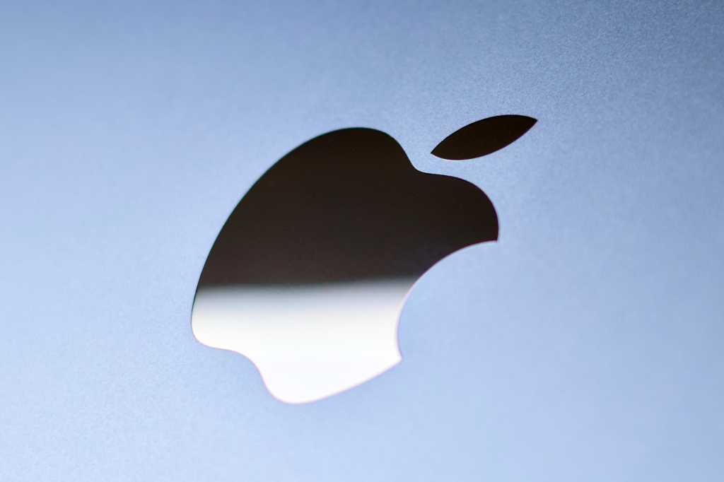 Apple logo on the back of a MacBook